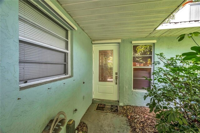 1966 9th St, Vero Beach, FL 32960 - view of exterior entry with stucco siding