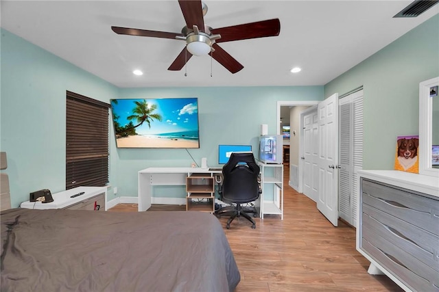 1966 9th St, Vero Beach, FL 32960 - bedroom with light wood-style flooring, recessed lighting, ceiling fan, and a closet