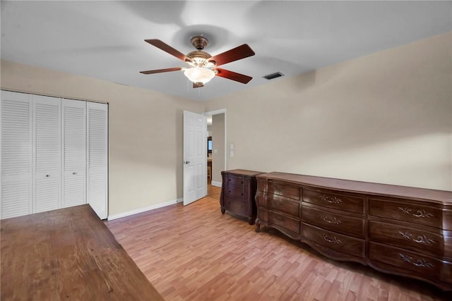 1966 9th St, Vero Beach, FL 32960 - unfurnished bedroom featuring light wood-type flooring, a closet, and a ceiling fan