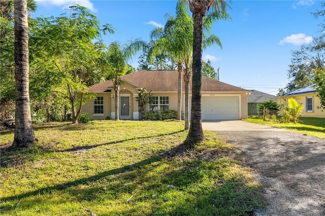 ranch-style house with a front yard and a garage