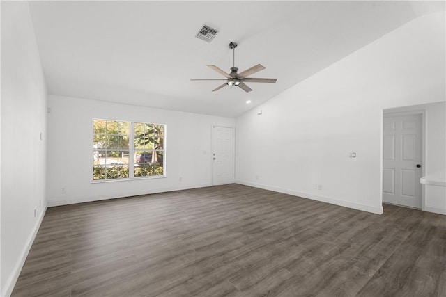 spare room with ceiling fan, dark hardwood / wood-style flooring, and lofted ceiling