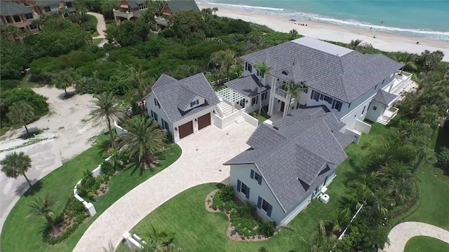 bird's eye view featuring a beach view and a water view