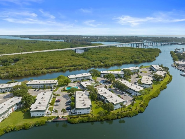 2800 Indian River Blvd Unit J1, Vero Beach, FL 32960 - drone / aerial view of a notable bridge, a nearby body of water, and apartment complex / building