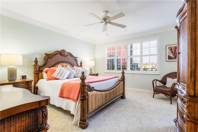 bedroom featuring ornamental molding, carpet, ceiling fan, and baseboards