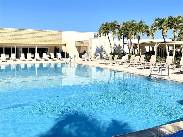 pool with a patio area