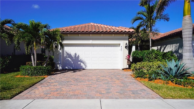 mediterranean / spanish-style home featuring a garage