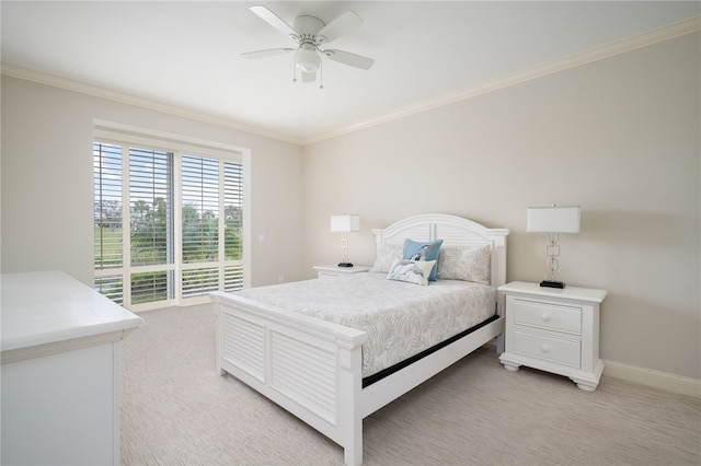 bedroom with ceiling fan, light colored carpet, and crown molding