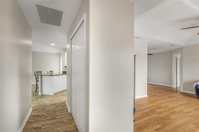 hall featuring light hardwood / wood-style floors