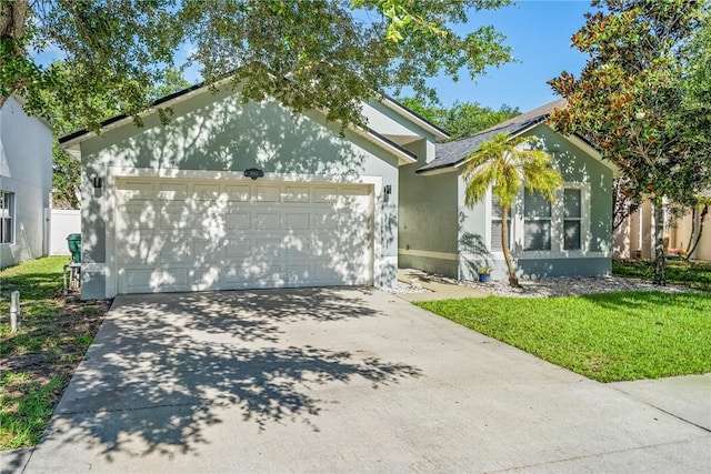 237 Stony Point Dr, Sebastian, FL 32958 - ranch-style house featuring a front yard, concrete driveway, an attached garage, and stucco siding