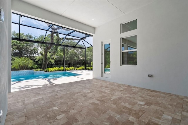 129 Strand Dr, Vero Beach, FL 32963 - outdoor pool featuring a patio and glass enclosure