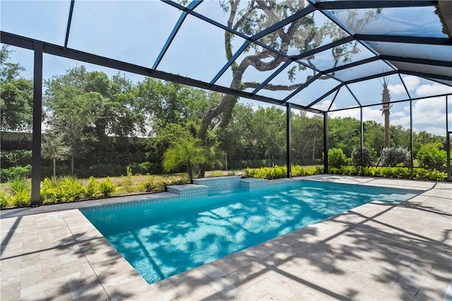 129 Strand Dr, Vero Beach, FL 32963 - outdoor pool with glass enclosure and a patio area