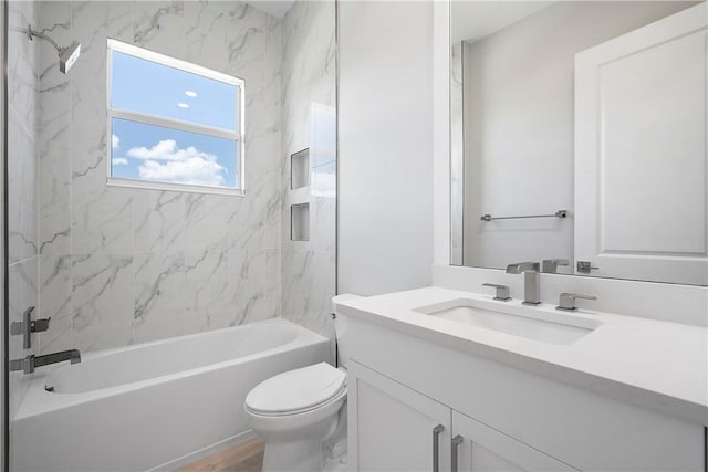 129 Strand Dr, Vero Beach, FL 32963 - bathroom featuring vanity, tub / shower combination, and toilet