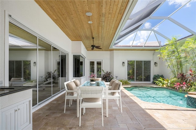 8455 Bay Leaf Ln Unit 11, Vero Beach, FL 32963 - outdoor pool featuring a patio, ceiling fan, a lanai, and outdoor dining space