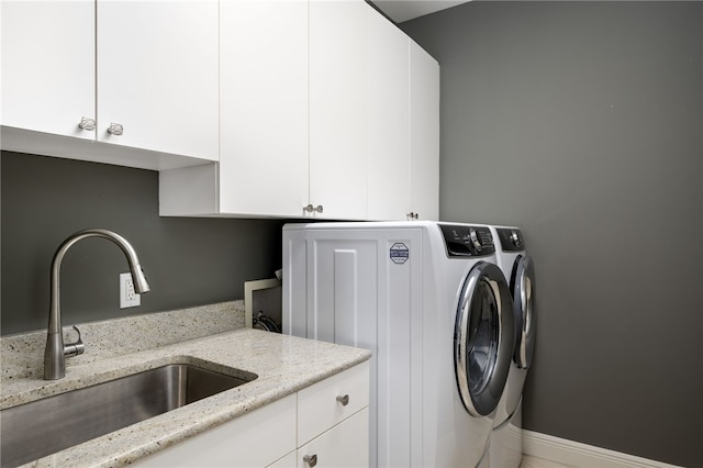 8455 Bay Leaf Ln Unit 11, Vero Beach, FL 32963 - laundry room featuring cabinet space and washer and dryer