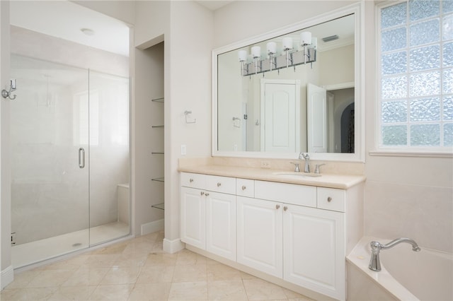 8455 Bay Leaf Ln Unit 11, Vero Beach, FL 32963 - full bathroom with a shower stall, vanity, a bath, and built in shelves