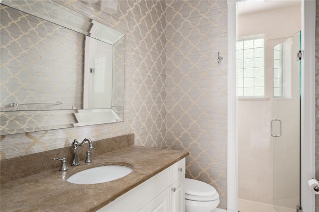 8455 Bay Leaf Ln Unit 11, Vero Beach, FL 32963 - full bathroom with toilet, a stall shower, and vanity