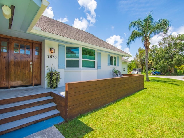 exterior space with a lawn