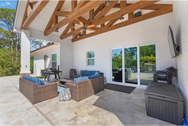 view of patio featuring ceiling fan and an outdoor living space