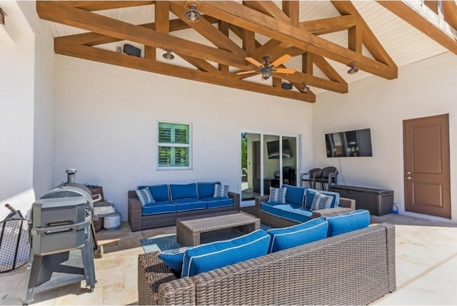 view of patio / terrace with an outdoor living space and ceiling fan