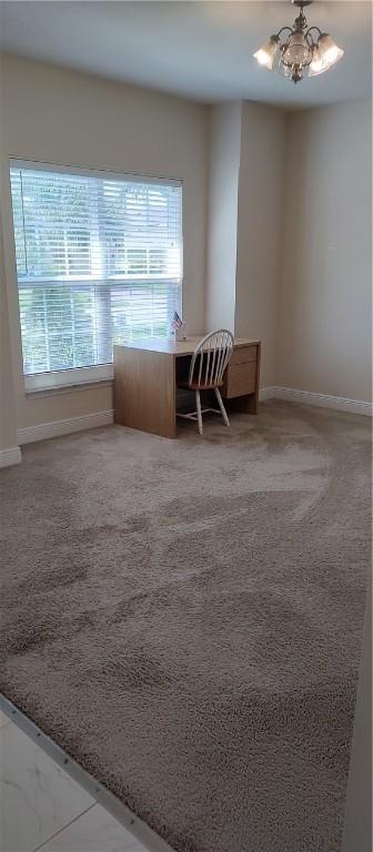 home office with baseboards and plenty of natural light