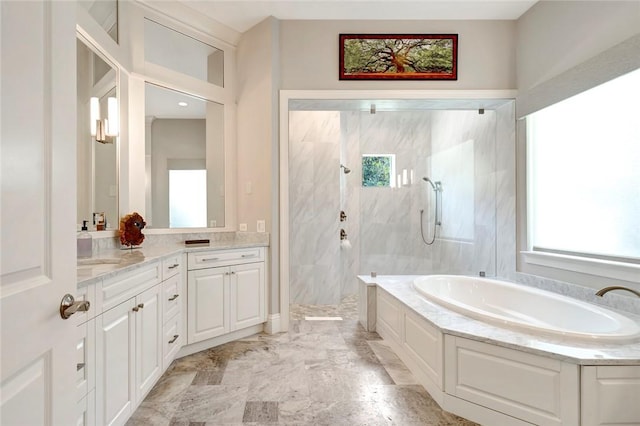 710 Canoe Trl, Vero Beach, FL 32963 - bathroom with a bath, a marble finish shower, vanity, and marble finish flooring