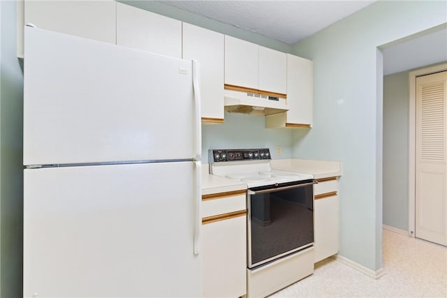 kitchen featuring white cabinetry and white appliances