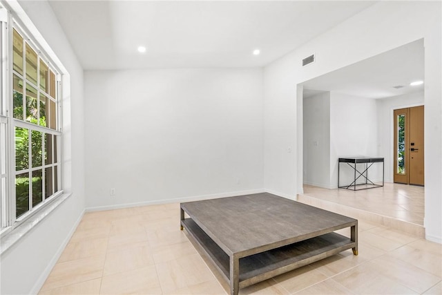 living area with light tile patterned floors