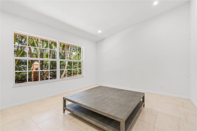 sitting room with light tile patterned flooring