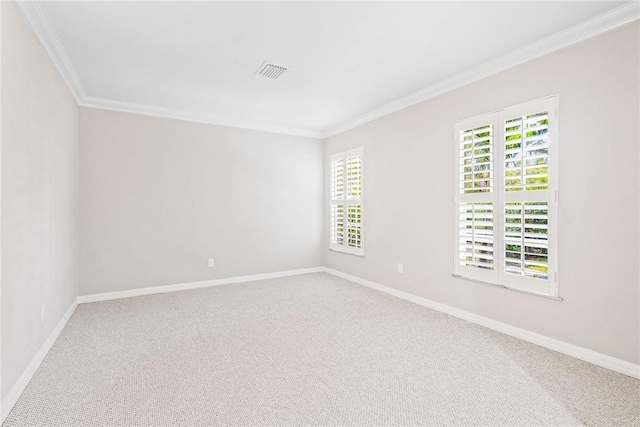 carpeted empty room with ornamental molding