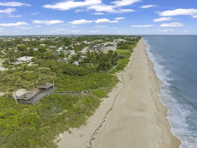 bird's eye view with a view of the beach and a water view