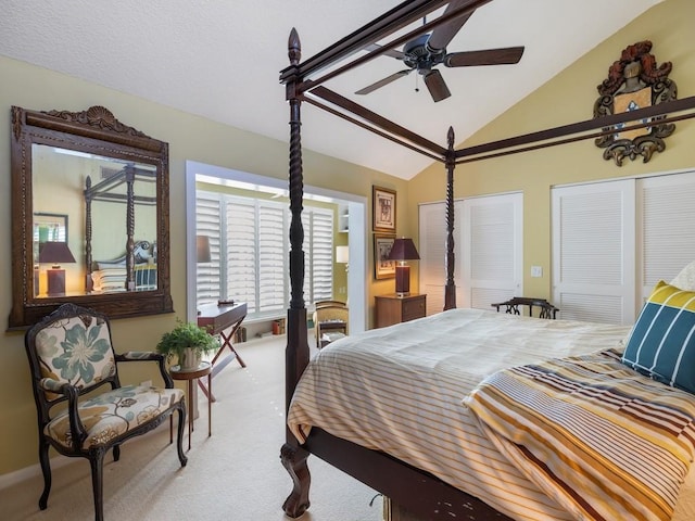 bedroom with a ceiling fan, carpet, and lofted ceiling