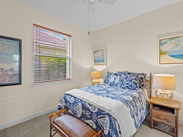 bedroom featuring ceiling fan and carpet floors