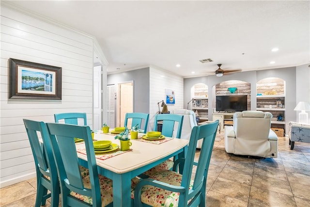 5020 Fairways Cir Unit J101, Vero Beach, FL 32967 - dining room with wood walls, ceiling fan, crown molding, and recessed lighting