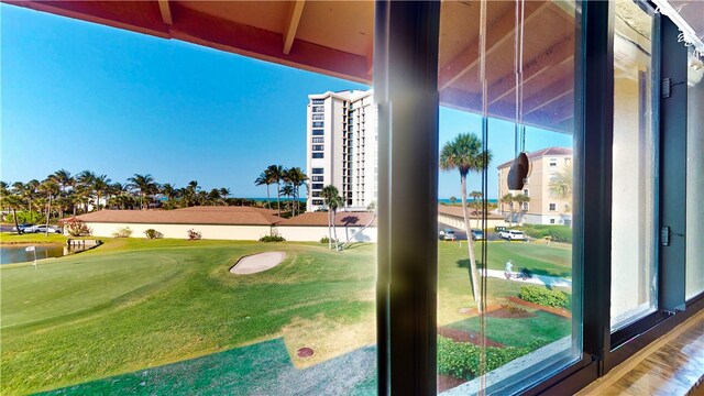 exterior space featuring plenty of natural light and a water view