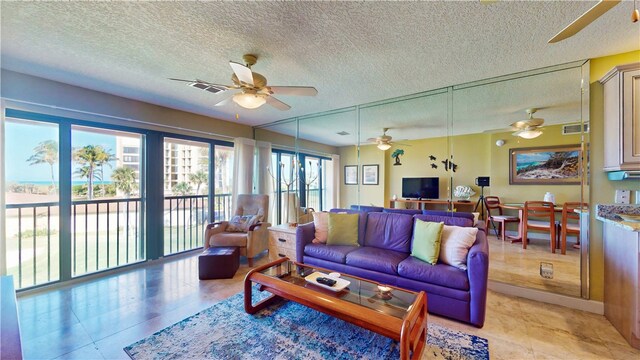 living room featuring a textured ceiling