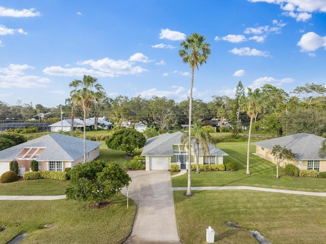 view of property's community featuring a lawn