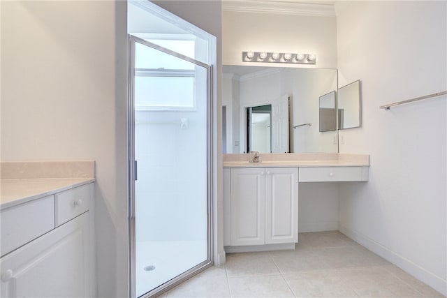 bathroom featuring walk in shower, vanity, tile patterned floors, and crown molding