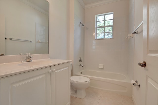 full bathroom featuring tiled shower / bath, vanity, crown molding, tile patterned floors, and toilet