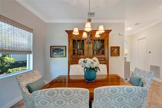 tiled dining area with a notable chandelier and ornamental molding