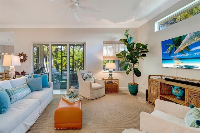 living room featuring crown molding and ceiling fan