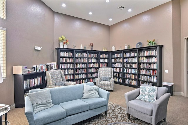 interior space featuring light carpet