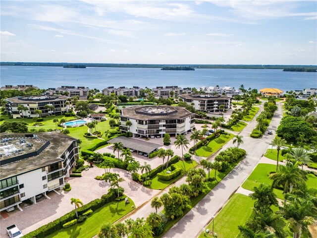 birds eye view of property featuring a water view