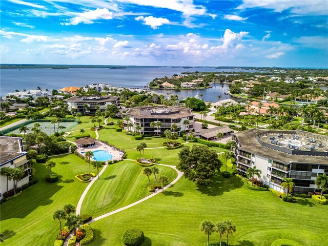 birds eye view of property featuring a water view