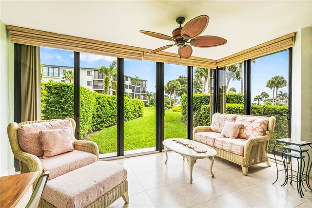 sunroom / solarium with ceiling fan