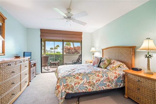 bedroom featuring access to outside, ceiling fan, and carpet