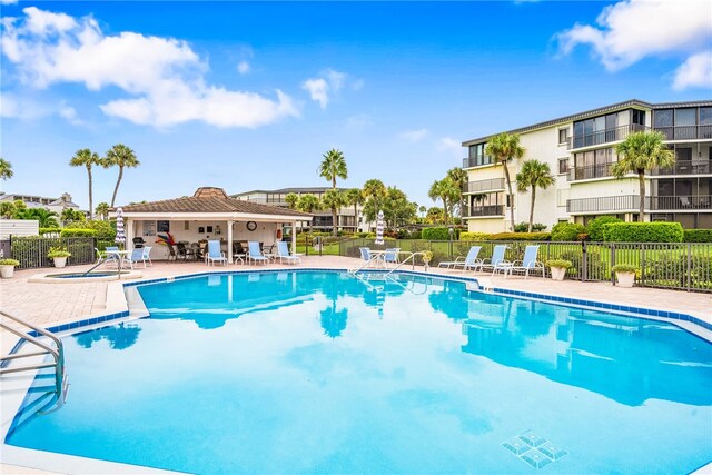 view of pool with a patio