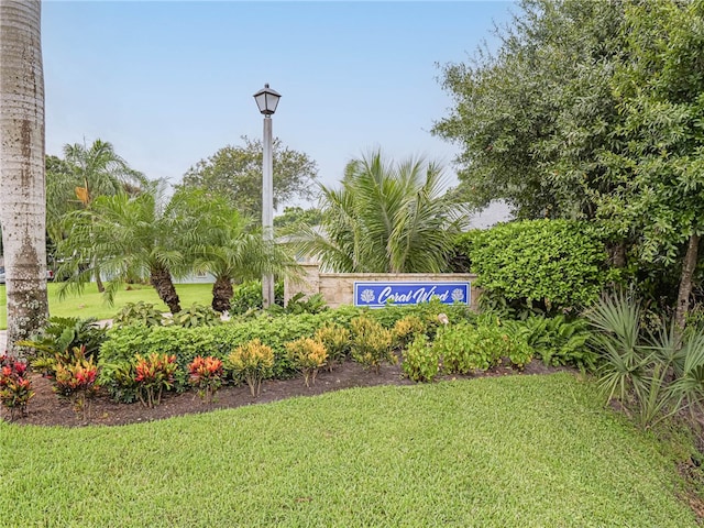 community sign with a lawn