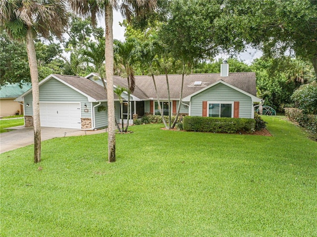 ranch-style house with a garage and a front yard