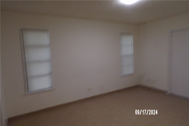 empty room with carpet floors