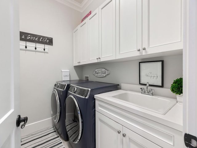 1618 W Sandpointe Pl, Vero Beach, FL 32963 - laundry room featuring cabinet space, washer and clothes dryer, and ornamental molding